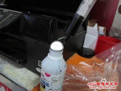 爱普生OFFICE TX300F系列打印机给墨盒注墨教程